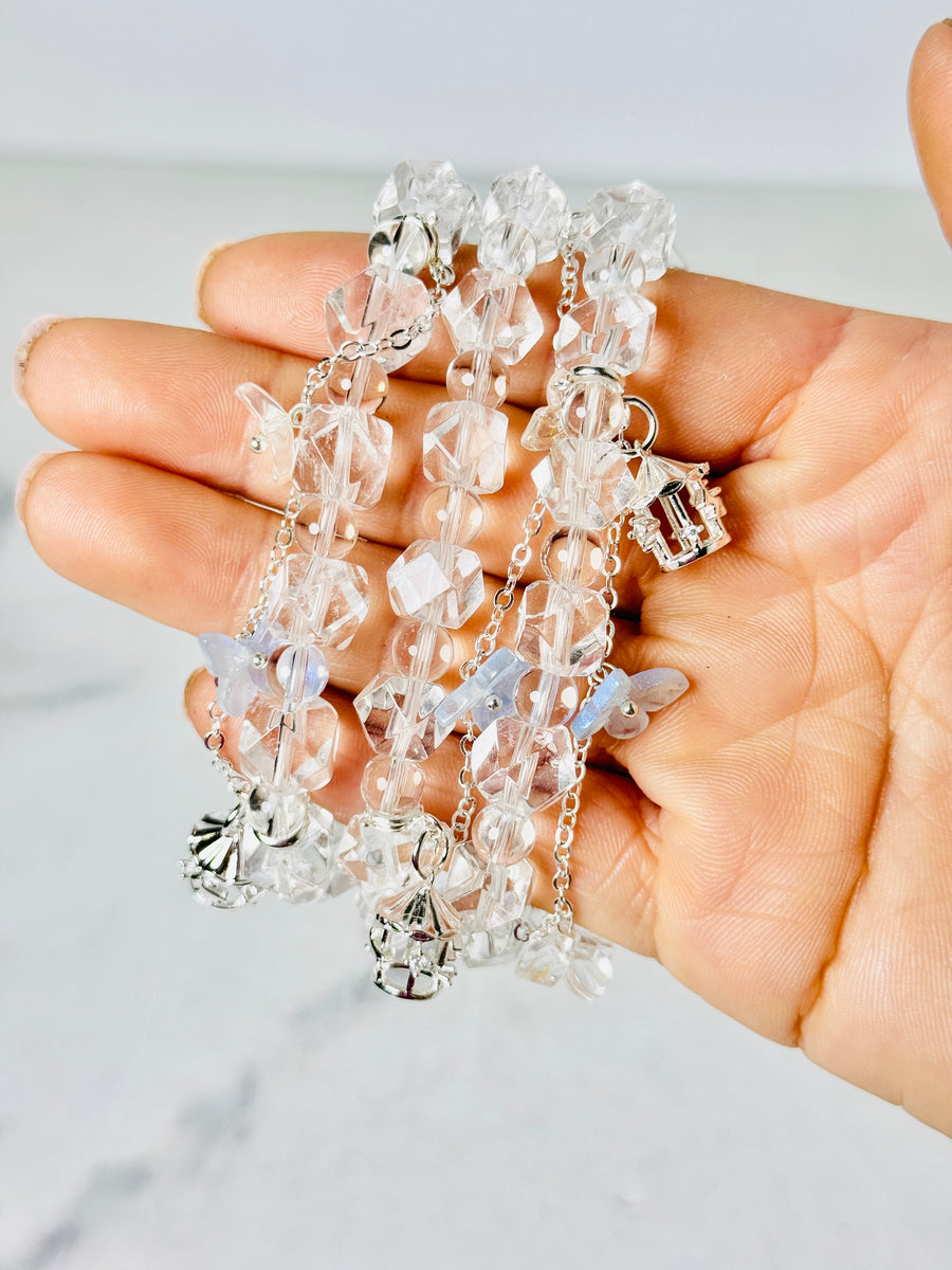 Clear Quartz Bracelet with Merry-Go-Round and Butterfly Charms